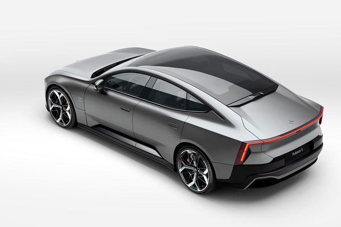 The 2025 Polestar 5 four-door electric GT car from the rear three quarters