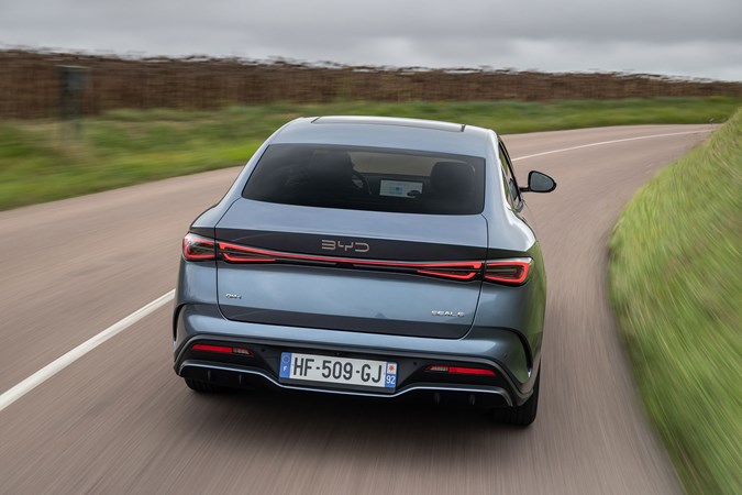 BYD Seal 6 DM-i saloon (2025) review: rear three quarter cornering grey paint