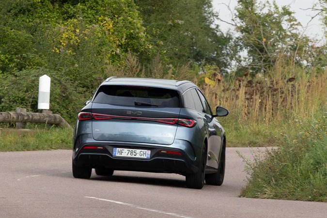 BYD Seal 6 DM-i Touring (2025) review: rear three quarter cornering, grey paint