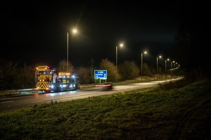 Image showing a traffic control vehicle stopped on a motorway hard shoulder at night