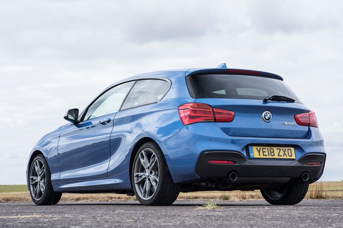 BMW M140i rear three-quarter view