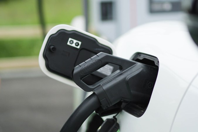 Used electric car sale growing - white EV charging