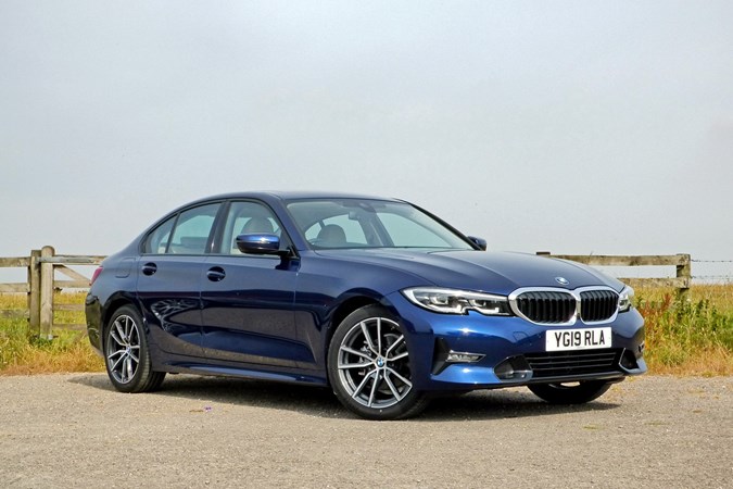 Blue 2019 BMW 318d Sport Saloon front three-quarter