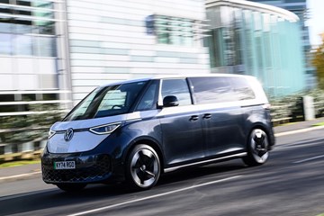 Volkswagen ID. Buzz, blue and white, exterior motion shot | Parkers Deal Watch Nearly New