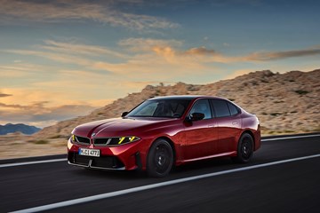 BMW M350 xDrive rear three-quarter driving