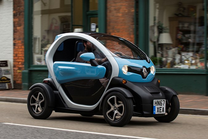 Blue and white 2018 Renault Twizy coupe front three-quarter driving