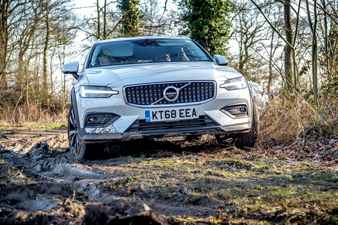 White 2019 Volvo V60 Cross Country driving off-road