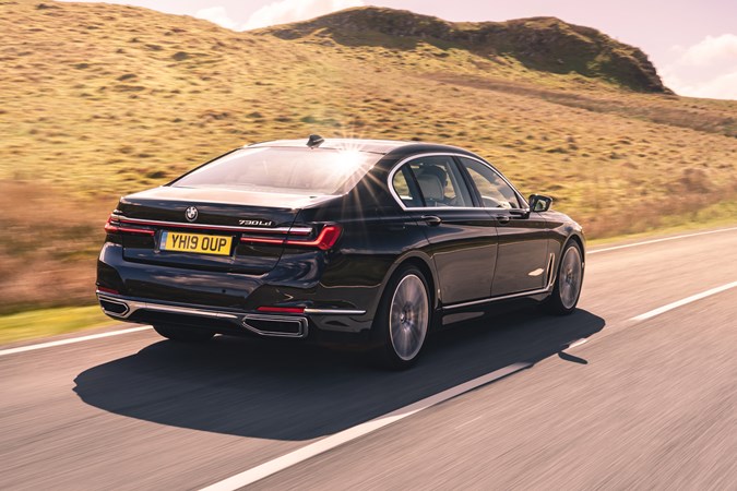 BMW 7 Series review, rear view, driving, sunny