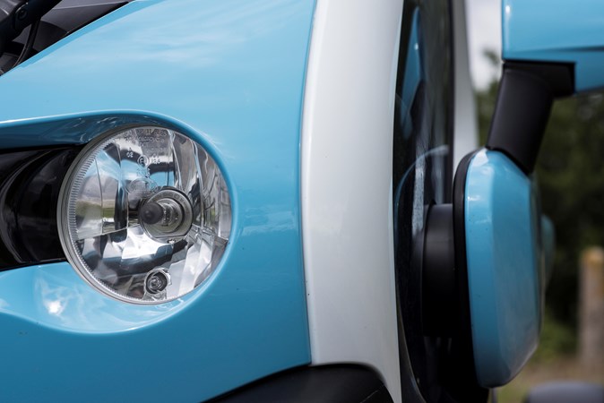 Blue and white 2018 Renault Twizy coupe headlamp detail